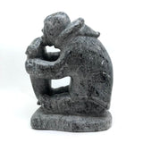 Large Inuit Stone Carving of Hunter Consuming Seal (with Damage)