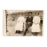 Young Man with Two Young Women in White Antique Real Photo Postcard