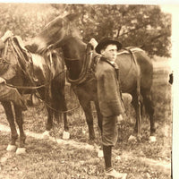 Two Young Men with Horses