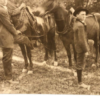 Two Young Men with Horses