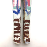 Colorfully Painted Folk Art Carved Wooden Figure with Cloth Covered Wire Arms