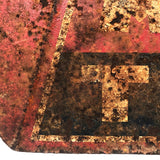 Much Eroded Old Atlas Tires Sign