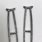 Tiny Metal Crutches