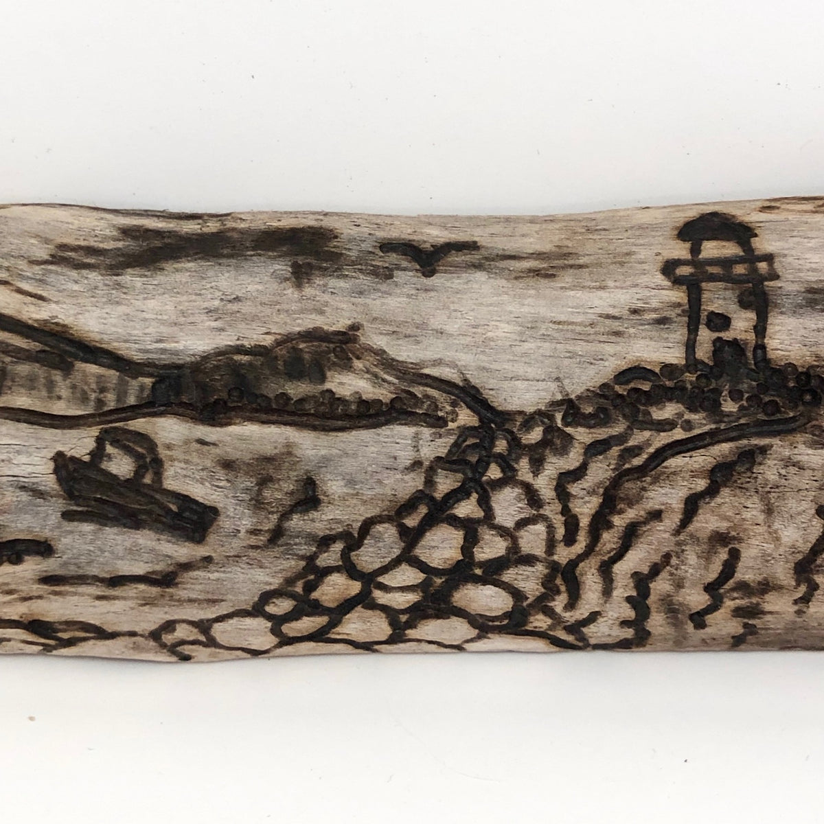 Pyrography Seascape on Driftwood with Lighthouse and Boats – critical ...