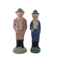 Two Little Composition Men In Pink and Blue Suits