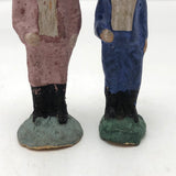 Two Little Composition Men In Pink and Blue Suits