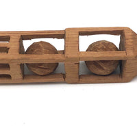 Finely Carved Architectural Whimsy with Three Balls in Cages