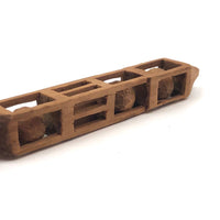 Finely Carved Architectural Whimsy with Three Balls in Cages