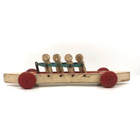 Fabulous 1920s Hustler Toy Co. Rowers in Skull Wooden Push Toy