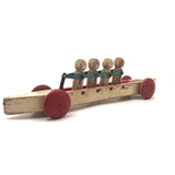 Fabulous 1920s Hustler Toy Co. Rowers in Skull Wooden Push Toy