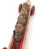 Fabulous 1920s Hustler Toy Co. Rowers in Skull Wooden Push Toy