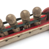 Fabulous 1920s Hustler Toy Co. Rowers in Skull Wooden Push Toy