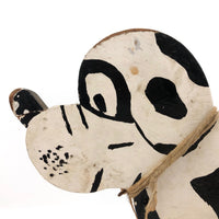 Black and White Dog on Red Wheels Old Wooden Pull Toy