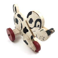Black and White Dog on Red Wheels Old Wooden Pull Toy