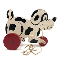 Black and White Dog on Red Wheels Old Wooden Pull Toy