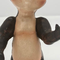 Curious Hand-painted Blue Eyed Porcelain Bear