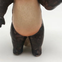 Curious Hand-painted Blue Eyed Porcelain Bear