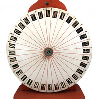Spinning Orange and White Carnival Wheel of Chance, A-Z Plus 1-6