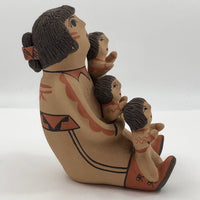 Sculpture of Storyteller Woman with Three Children by Jemez, New Mexico Native American Artist Emily Fragua-Tsosie