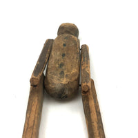 Antique Carved, Jointed Figure with Hand-drawn Face and Button Front
