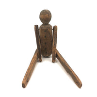Antique Carved, Jointed Figure with Hand-drawn Face and Button Front