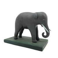Early 20th Century Beautifully Carved and Painted Folk Art Elephant with Tusks