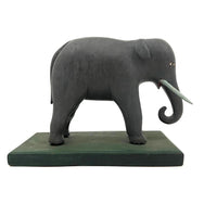 Early 20th Century Beautifully Carved and Painted Folk Art Elephant with Tusks