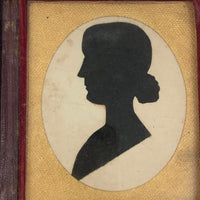 Black and White Cut Paper Silhouettes of Young Woman in Antique Pocket Frame