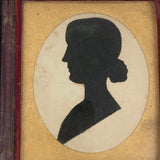 Black and White Cut Paper Silhouettes of Young Woman in Antique Pocket Frame