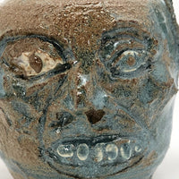 Toothy Small Folk Art Pottery Face Jugs - A Pair