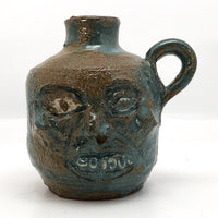 Toothy Small Folk Art Pottery Face Jugs - A Pair