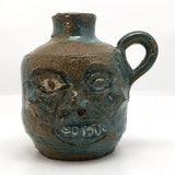 Toothy Small Folk Art Pottery Face Jugs - A Pair