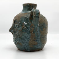 Toothy Small Folk Art Pottery Face Jugs - A Pair