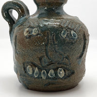 Toothy Small Folk Art Pottery Face Jugs - A Pair
