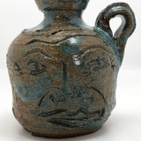 Toothy Small Folk Art Pottery Face Jugs - A Pair