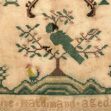 19th Century Needlepoint Sampler with Parrot, Pistols, and Fleur de Lis