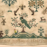 19th Century Needlepoint Sampler with Parrot, Pistols, and Fleur de Lis