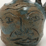 Toothy Small Folk Art Pottery Face Jugs - A Pair