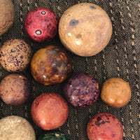 Handful of Antique Clay Marbles in Old Fabric Pouch