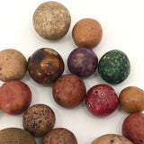 Handful of Antique Clay Marbles in Old Fabric Pouch