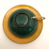 Jewel Tone Enamel Cup and Saucer with Woven Raffia Handle