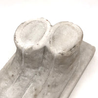 Naively Carved Marble Child's Boots