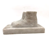 Naively Carved Marble Child's Boots