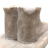 Naively Carved Marble Child's Boots