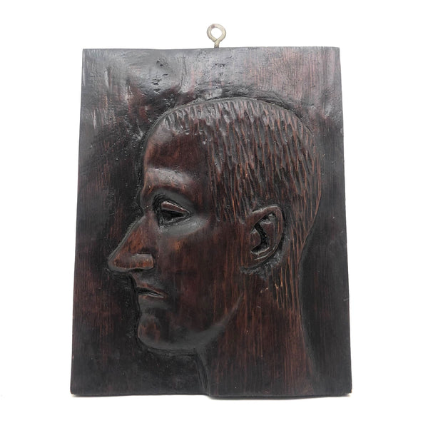 Vintage Relief Carving of Melancholic Looking Young Man