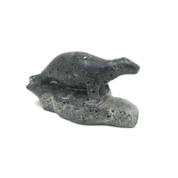 Inuit Carved Stone Seal on Rock