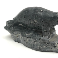 Inuit Carved Stone Seal on Rock