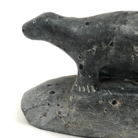 Inuit Carved Stone Seal on Rock