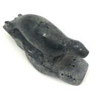 Inuit Carved Stone Seal on Rock