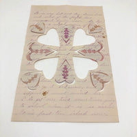 Antique Cut and Woven Paper Hearts on Hand-written Letter